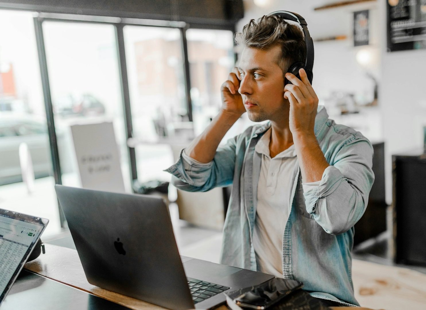 Support specialist wearing a headset at her workstation