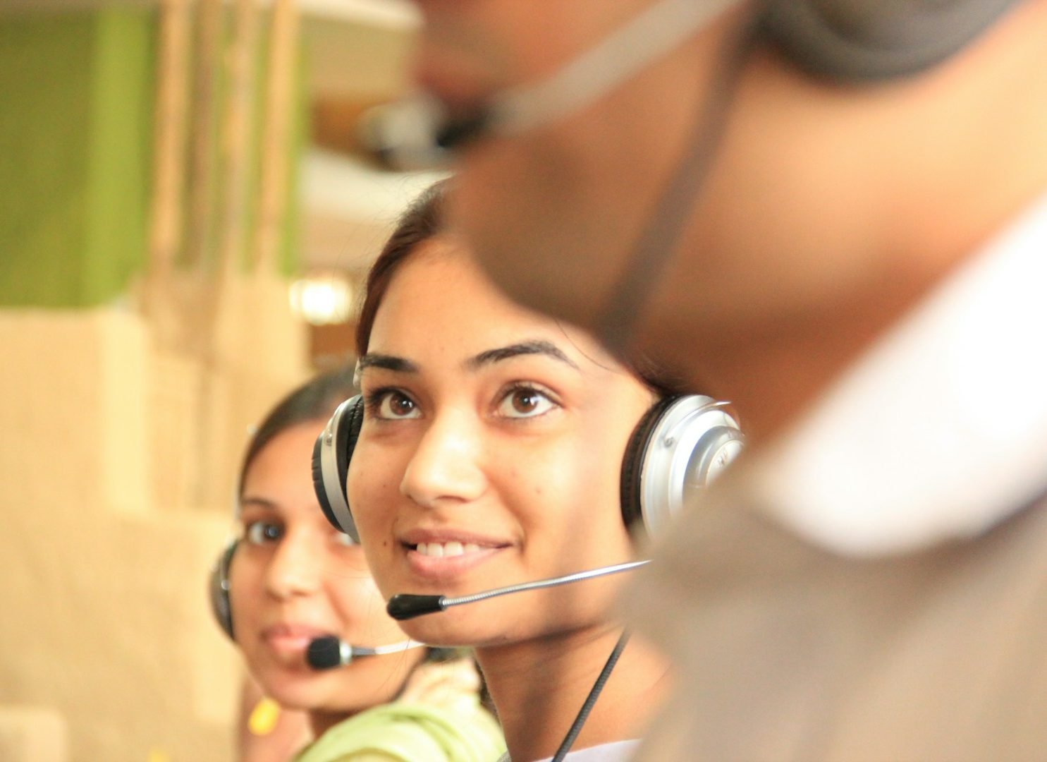 Support specialists wearing headsets